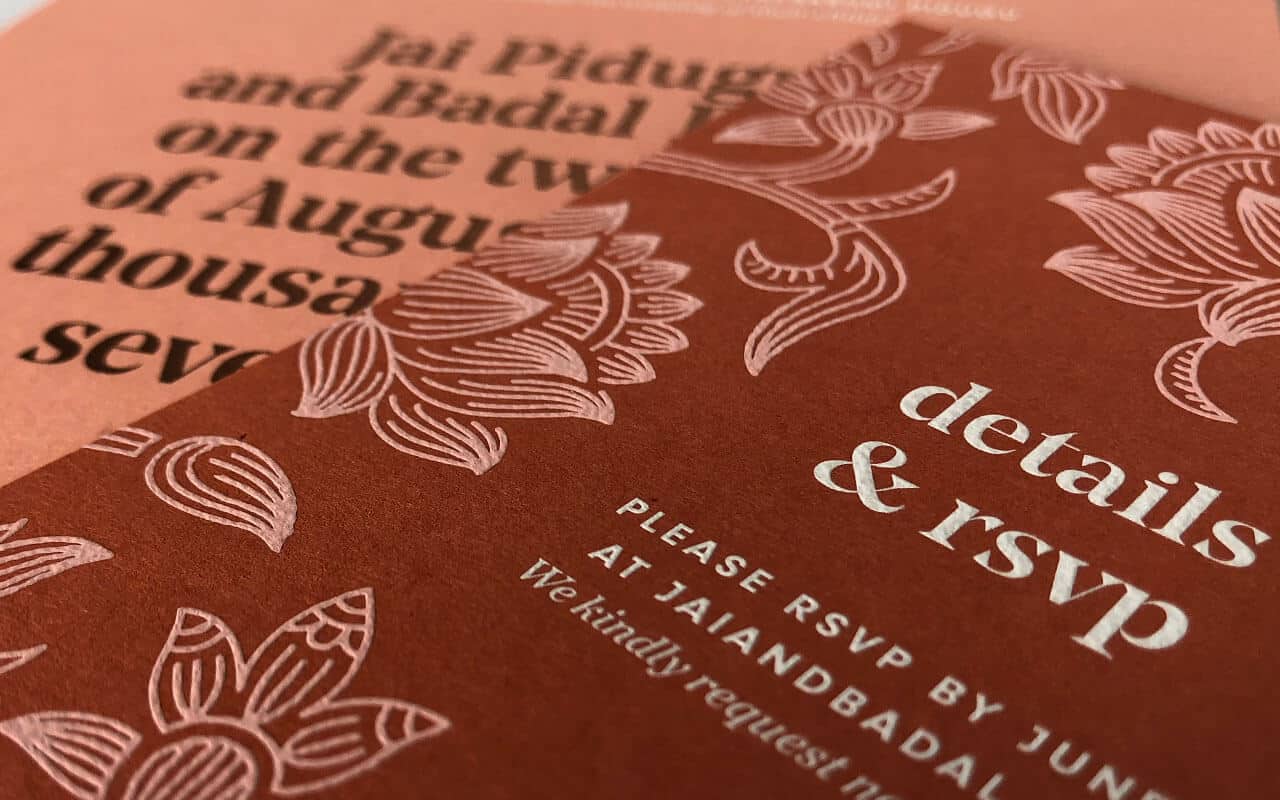Engraved Wedding Invitation with metallic and white ink on colored paper